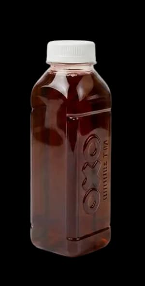 Bottle of OXO tea concentrate, amber