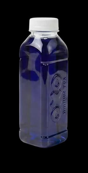 Bottle of OXO tea concentrate, blue
